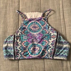 High neck top with purple bottoms